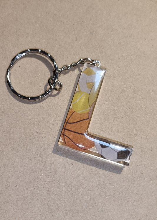 Portachiavi Iniziale personalizzato a tema